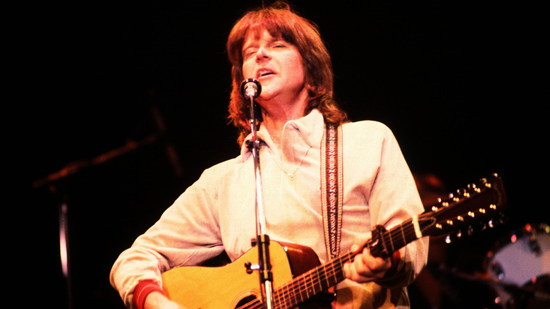 Randy Meisner playing guitar and singing