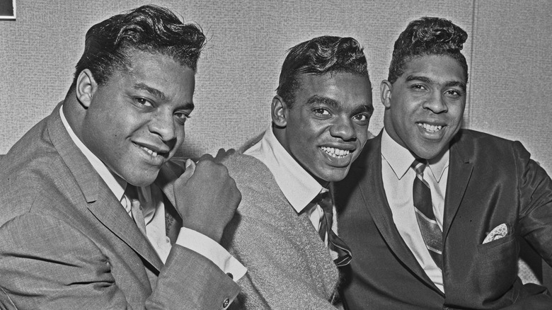 The Isley Brothers posing for a photo