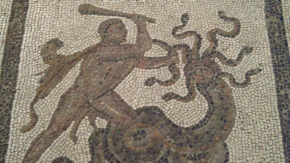 Mosaic of a hydra being clubbed by a man