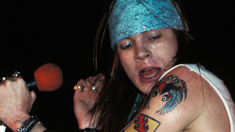 Axl Rose singing onstage