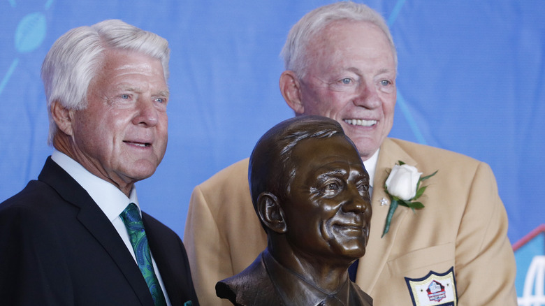 Jerry Jones Jimmy Johnson smiling side