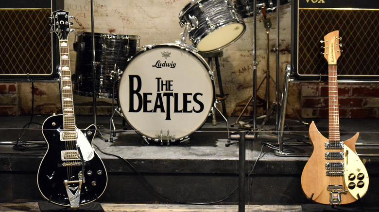 Empty stage with Beatles instruments set up