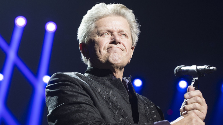 Peter Cetera grinning onstage