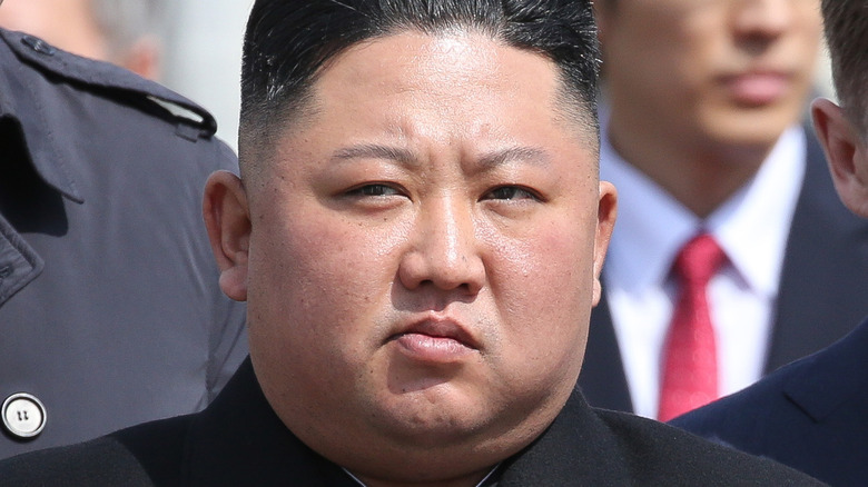 Kim Jong-Un standing