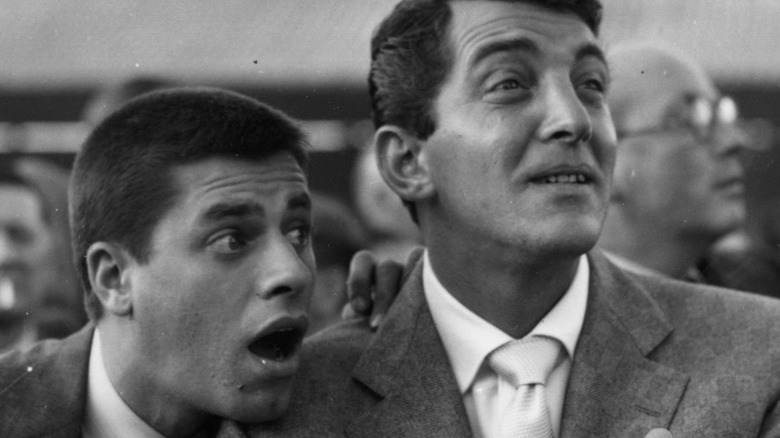 Jerry Lewis and Dean Martin, looking away