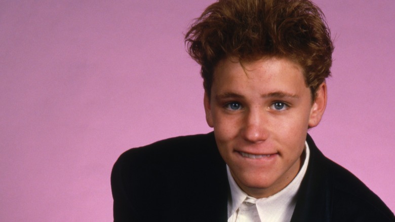 Corey Haim head shot with pick background
