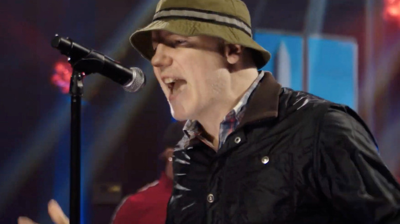 gregg alexander in bucket hat as new radicals plays virtual inauguration 2021