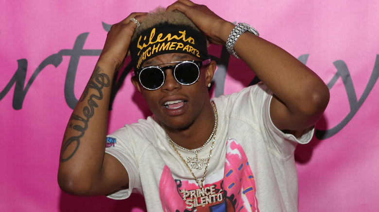 Silento posing for photo at event