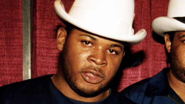 Paul Costict of B-Rock and the Bizz posing in white derby hat