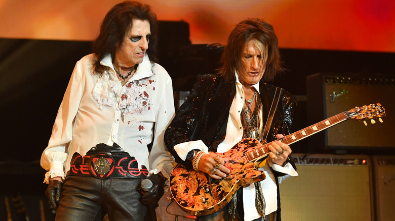 Alice Cooper and Joe Perry performing live on stage