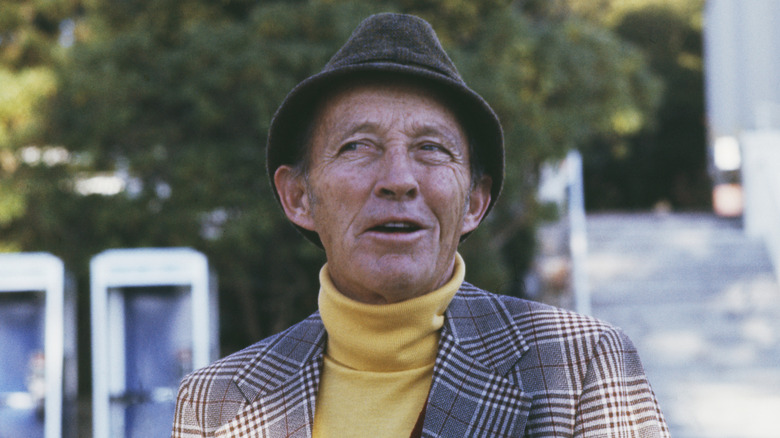 Bing Crosby talking outside in 1977