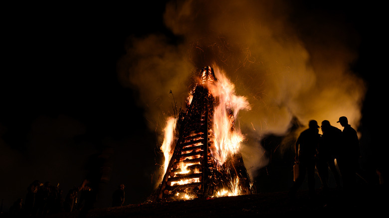 people gathered for Bonfires on the Levee