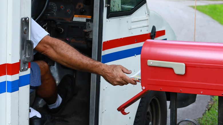 Person delivering mail