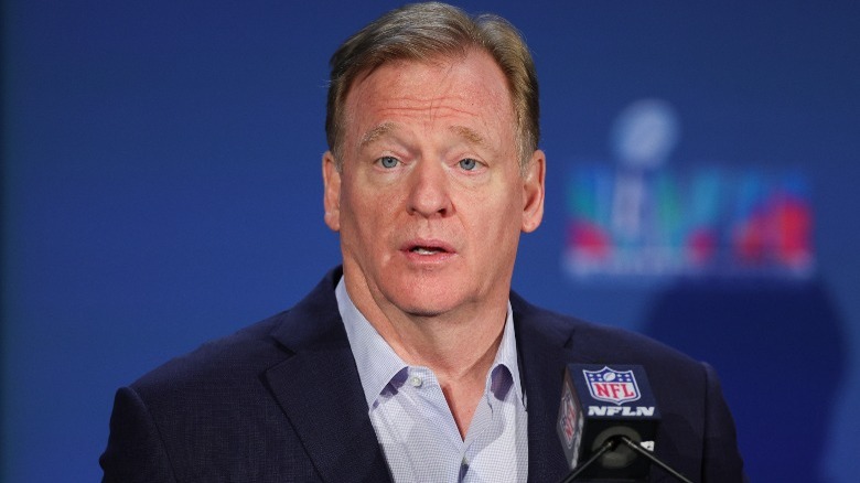 Roger Goodell speaking at podium