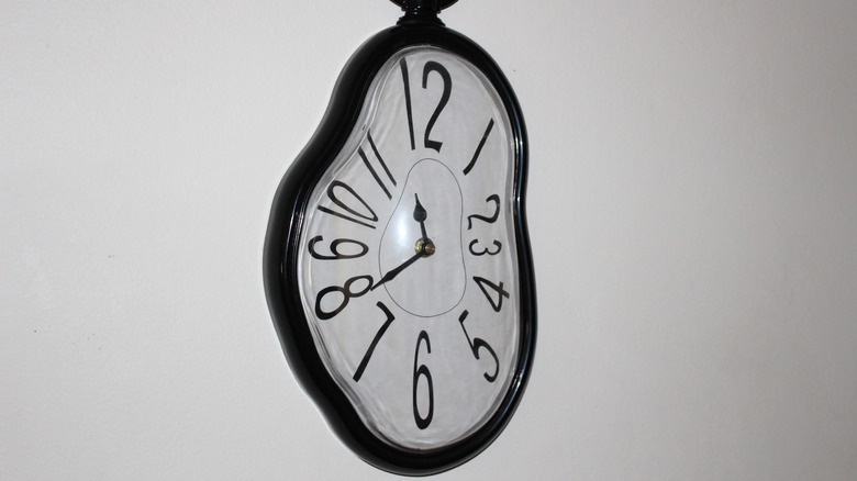 warped clock white background