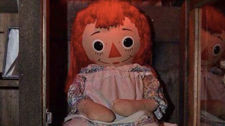 actual Annabelle doll in enclosure