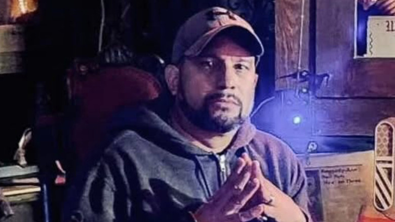 Dan Rivera surrounded by ghost detecting equipment