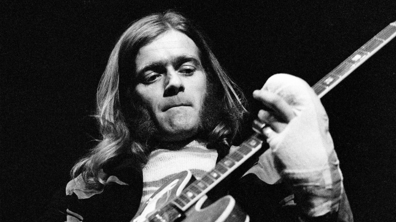 Henry McCullough playing guitar
