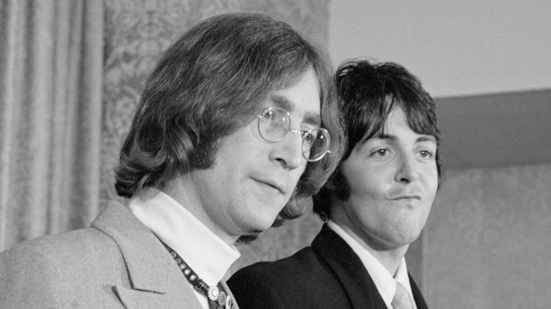 Black and white photo of John Lennon and Paul McCartney