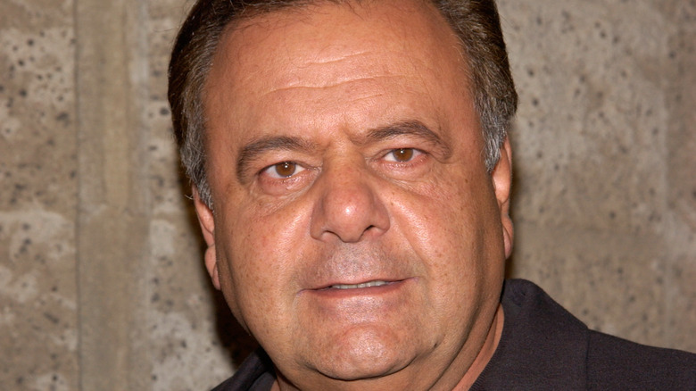 Paul Sorvino staring