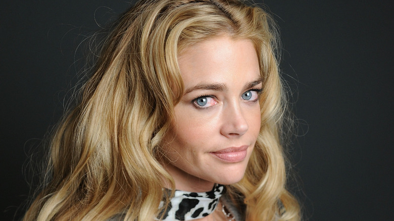 Denise Richards poses