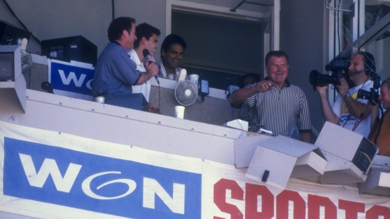 Mike Ditka prepares to sing