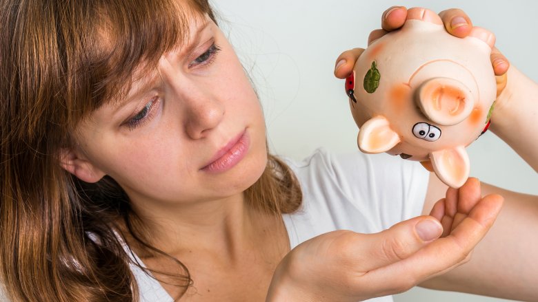 woman, piggy bank