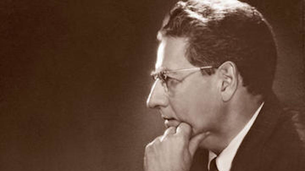 Jerome Rodale glasses hand on chin
