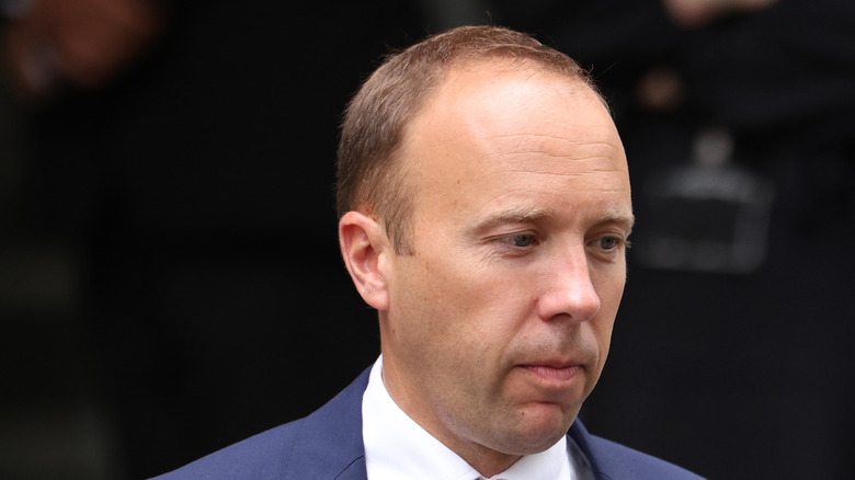 Matt Hancock looks down