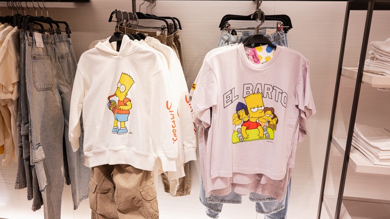 bart simpson shirts hanging on racks in store