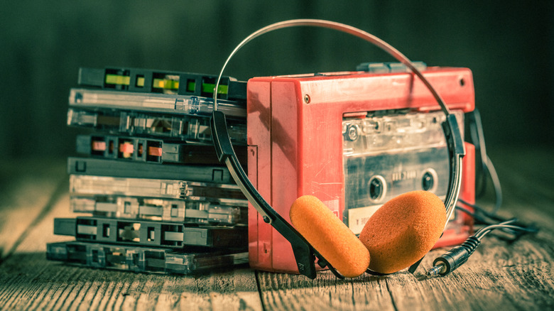 Cassette player next to tapes