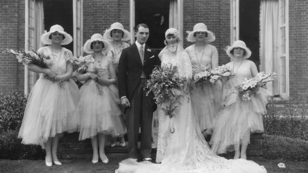 Bride surrounded by bridesmaids