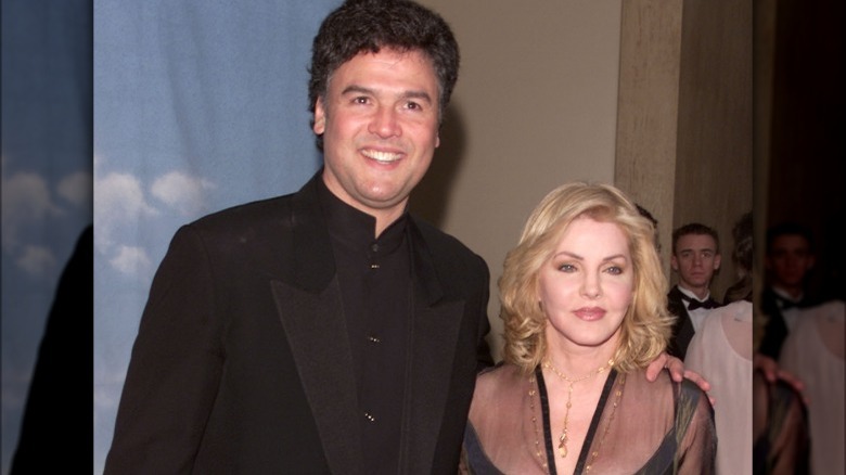 Priscilla Presley and Marco Garabaldi posing for photos