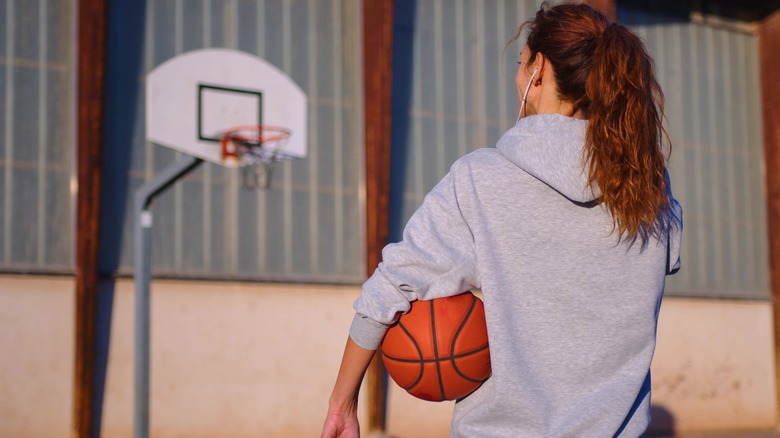 Generic photo of woman with basketball