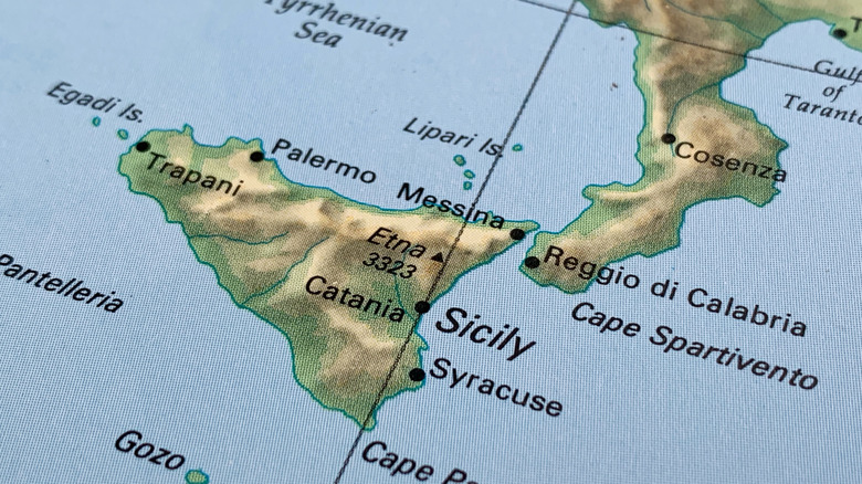 Sicily and Italy on atlas map