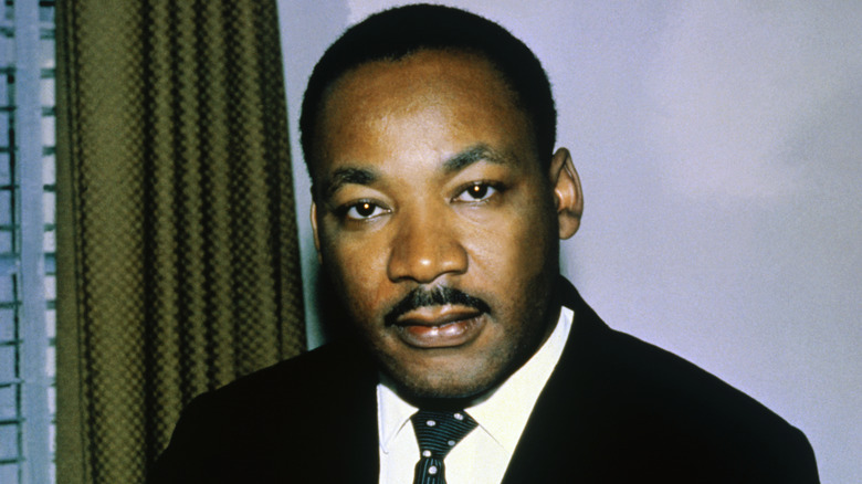Martin Luther King stares into camera in portrait