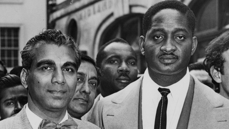 Cheddi Jagan and Forbes Burnham smiling