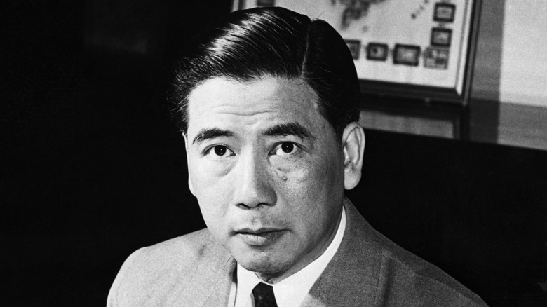 President Ngo Dinh Diem sitting at desk and looking at camera