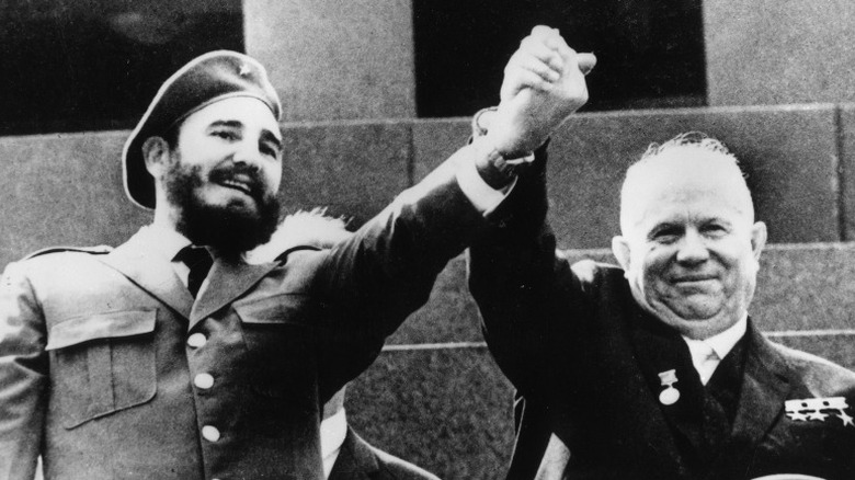 Fidel Castro and Niki Khrushchev embracing