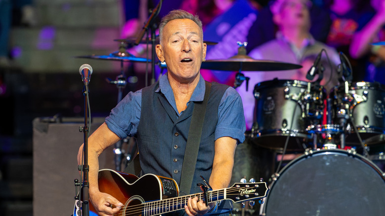 Bruce Springsteen onstage with guitar