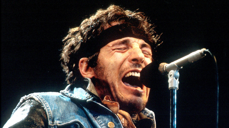 Bruce Springsteen holding a microphone.