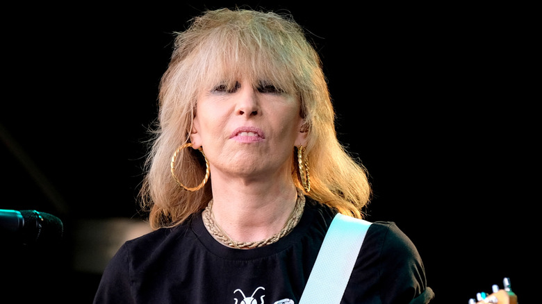 Chrissie Hynde onstage with guitar