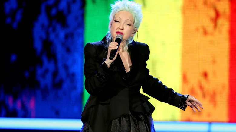 Cyndi Lauper singing on stage