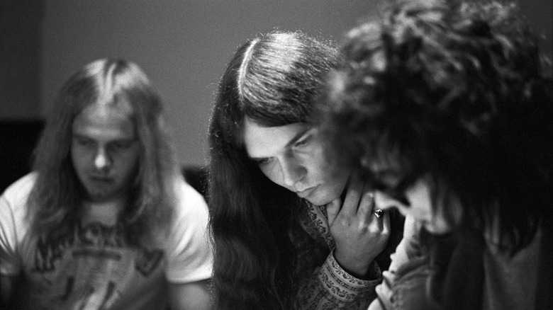Ronnie Van Zant and Gary Rossington in the studio with producer