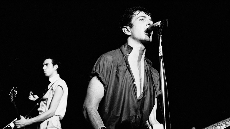 Joe Strummer onstage with Mick Jones