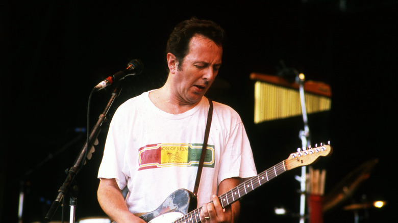 Joe Strummer onstage at Glastonbury in 1999