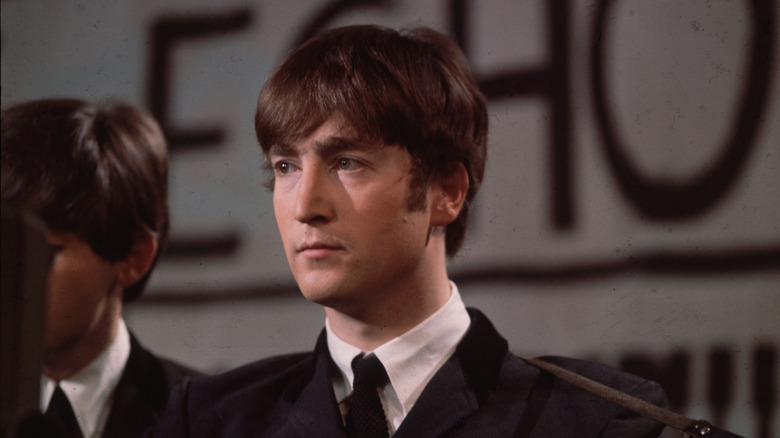 John Lennon staring off on TV