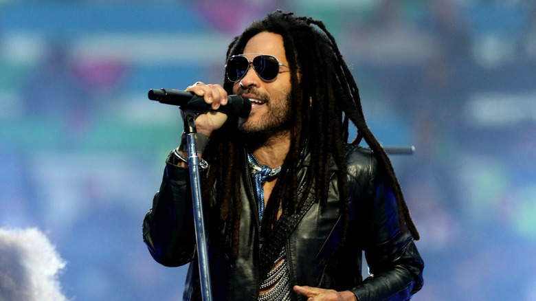 Lenny Kravitz singing on stage