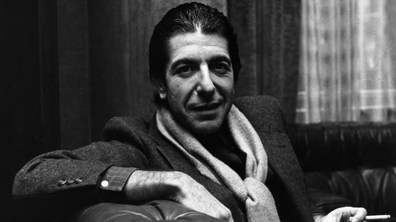 Leonard Cohen smiling and smoking