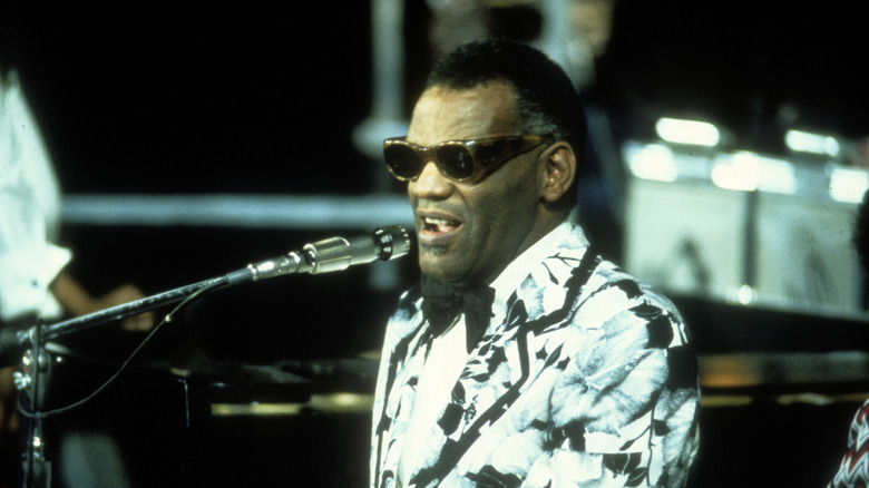 Ray Charles at piano with microphone